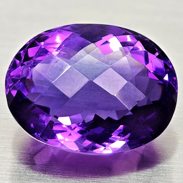 Natural Purple Amethyst Gemstones 14.12 Ct. Oval Shape 17 x 13 Mm.: Product ID: 800325490 Product Name: Natural Amethyst Weight: 14.12 CT. Size: 17 x 13 x 10.7 MM. Shape: Oval Color: Purple Clarity:VSI Luster: Good Gems Origin: Brazil Treatment: Unheated Crystal Struc
