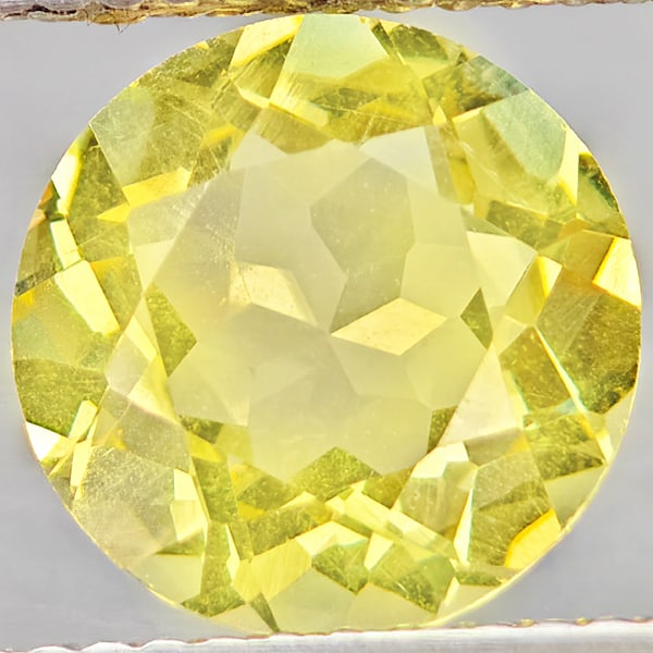 Natural Yellow Lemon Quartz Gemstones 2.55 Ct. Round Shape 9.1 Mm.: Product ID: 805530215 Product Name: Natural Quartz Weight: 2.55 CT. Size: 9.1 x 9.1 x 5.5 MM. Shape: Round Color: Yellow Lemon Clarity:VSI Luster: Good Gems Origin: Brazil Treatment: Unheated Crystal 