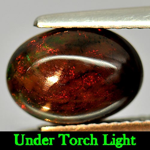 Natural Play Of Color Rainbow Fire Red Black Opal Gemstones 1.96 Ct. Oval Cabochon Shape 10.7 x 7.7: Product ID: 818724314 Product Name: Natural Opal Weight: 1.96 CT. Size: 10.7 x 7.7 x 4.7 MM. Shape: Oval Cabochon Color: Multi-Color Clarity:Semi - Transparent Luster: Iridescent Gems Origin: Ethiopia