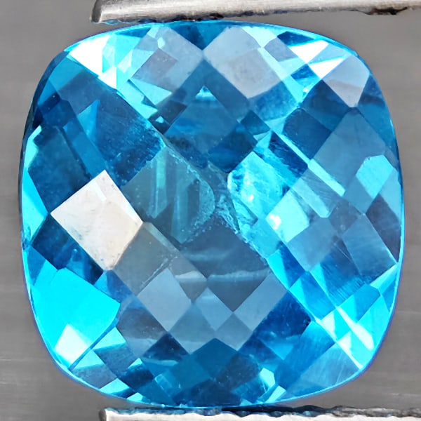 Natural Baby Blue Topaz Gemstones 4.15 Ct. Cushion Checkerboard Cut 9.9 Mm.: Product ID: 807129790 Product Name: Natural Blue Topaz Weight: 4.15 CT. Size: 9.9 x 9.9 x 5.6 MM. Shape: Cushion Checkerboard Cut Color: Baby Blue Clarity:SI1 Luster: Good Gems Origin: Brazil Treatmen