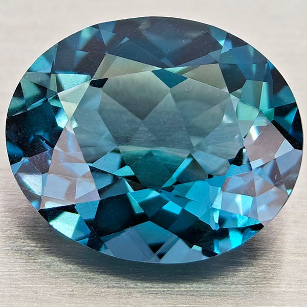 Natural London Blue Topaz Gemstones 3.84 Ct. Oval Shape 11 x 9.11 Mm.: Product ID: 807168423 Product Name: Natural Blue Topaz Weight: 3.84 CT. Size: 9.11 x 11 x 5.2 MM. Shape: Oval Color: London Blue Clarity:VVS - VSI Luster: Very Good Gems Origin: Brazil Treatment: Trea
