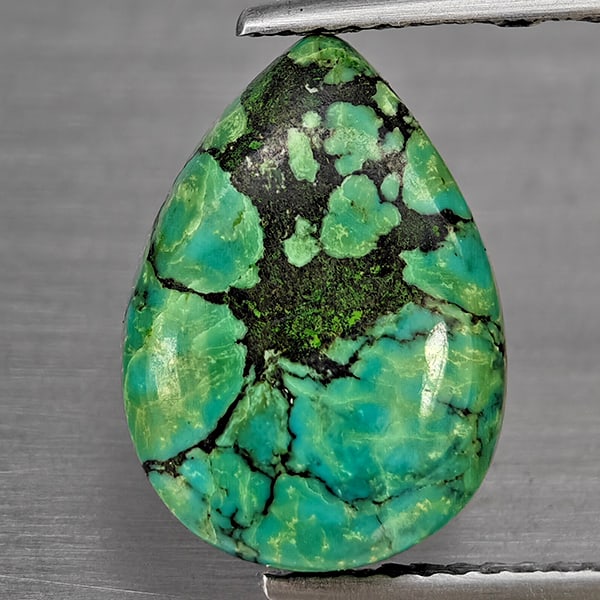 Natural Multi Color Green Turquoise Gemstones 3.90 Ct. Pear Shape Cabochon 14.4 x 10.2 Mm.: Product ID: 809100039 Product Name: Natural Gemstones Weight: 3.90 CT. Size: 14.4 x 10.2 x 4.1 MM. Shape: Pear Cabochon Color: Multi Color Green Clarity:Opaque Luster: Good Gems Origin: India Treatmen