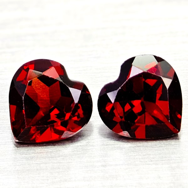 Natural Orangish Red Garnet Gemstones 2.89 Ct. 2 Pcs. Heart Shape 7 x 7 Mm.: Product ID: 802936645 Product Name: Natural Red Garnet Weight: 2.89 CT. Size: 7 x 7 x 3.1 MM. Shape: Heart Shape Color: Orangish Red Clarity:VSI Luster: Good Gems Origin: Tanzania Treatment: Unheated 
