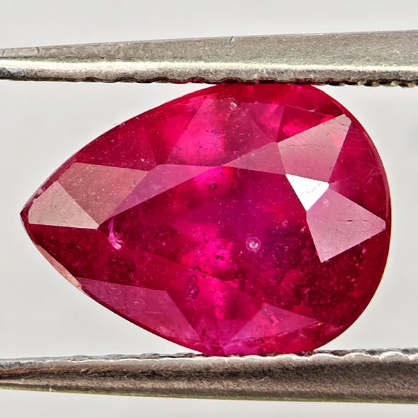 Natural Purplish Red Ruby Gemstones 2.43 Ct. Pear Shape 9.1 x 7.2 Mm.: Product ID: 805935539 Product Name: Natural Ruby Weight: 2.43 CT. Size: 9.1 x 7.2 x 5.1 MM. Shape: Pear Shape Color: Purplish Pink Clarity:VSI - SI1 Luster: Good Gems Origin: Madagascar Treatment: Hea