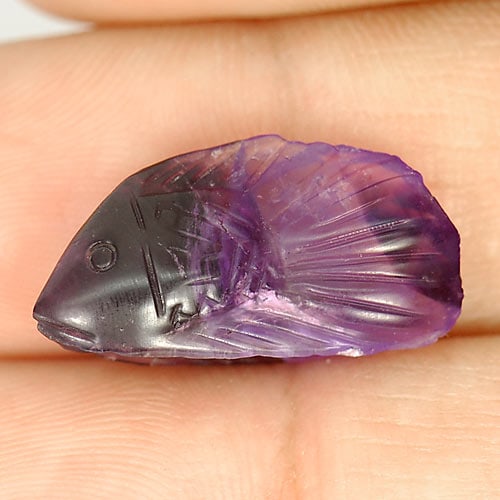 Natural Violet Amethyst Gemstones 7.79 Ct. Fish Carving Shape 20 x 11 Mm.: Product ID: 810303348 Product Name: Natural Amethyst Weight: 7.79 CT. Size: 20 x 11 x 6.6 MM. Shape: Fish Carving Color: Violet Clarity:Semi - Transparent Luster: Good Gems Origin: Brazil Treatment: U
