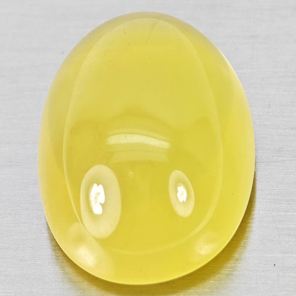 Natural Yellow Quartz Gemstones 58.66 Ct. Oval Cabochon Shape 28 x 19 Mm.: Product ID: 805529996 Product Name: Natural Quartz Weight: 58.66 CT. Size: 28 x 19 x 14 MM. Shape: Oval Cabochon Color: Yellow Lemon Clarity:Semi - Transparent Luster: Good Gems Origin: Brazil Treatme