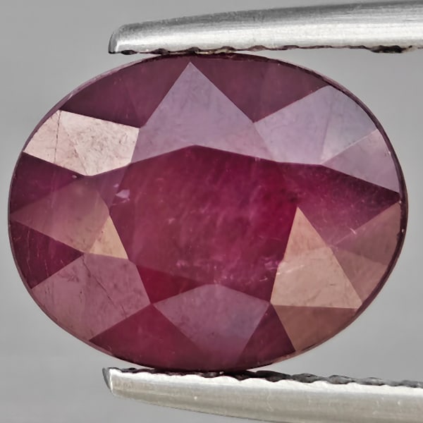 Natural Purplish Red Ruby Gemstones 5.18 Ct. Oval Shape 10.6 x 8.6 Mm.: Product ID: 805935951 Product Name: Natural Ruby Weight: 5.18 CT. Size: 10.6 x 8.6 x 6.2 MM. Shape: Oval Color: Purplish Red Clarity:SI1 Luster: Good Gems Origin: Madagascar Treatment: Heated (Lead-gl