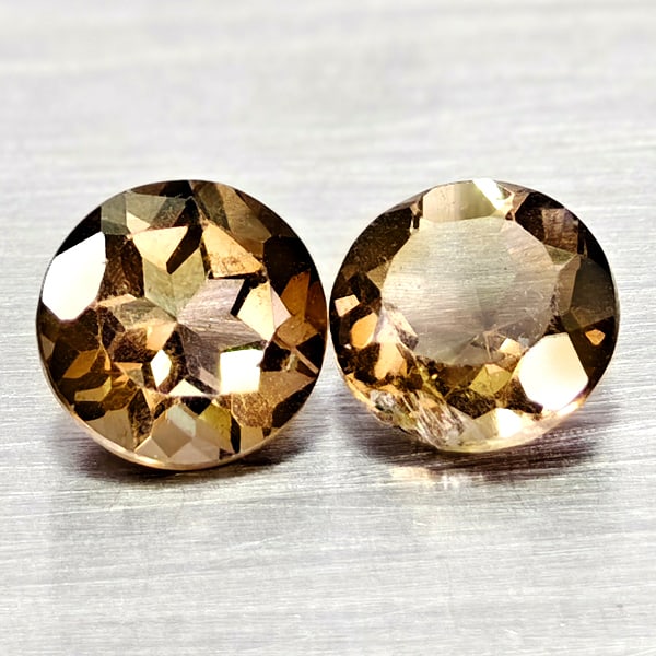 Natural Smokey Color Quartz Gemstones 1.43 Ct. 2 Pcs. Round Shape 6.1 Mm.: Product ID: 805529900 Product Name: Natural Quartz Weight: 1.43 CT. Size: 6.1 x 6.1 x 3.9 MM. Shape: Round Color: Smokey Clarity:VSI Luster: Good Gems Origin: Brazil Treatment: Unheated Crystal Struct