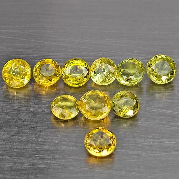 Natural Greenish Yellow Titanium Sphene Gemstones Rainbow Spark 2.65 Ct. 10 Pcs Round Shape 4 Mm.: Product ID: 806509361 Product Name: Natural Sphene Weight: 2.65 CT. Size: 4 x 4 x 2.3 to 3.4 x 3.4 x 2.5 MM. Shape: Round Color: Greenish Yellow Clarity:SI1 Luster: Good Gems Origin: Madagascar Treatm