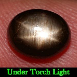 Natural Black Star Sapphire Gemstones 3.32 Ct. Oval Cabochon Shape 8.9 x 7 Mm.: Product ID: 806137535 Product Name: Natural Star Sapphire Weight: 3.32 CT. Size: 8.9 x 7 x 4.5 MM. Shape: Oval Cabochon Color: Black Clarity:Opaque Luster: Good 6 Rays Star Gems Origin: Thailand Treat