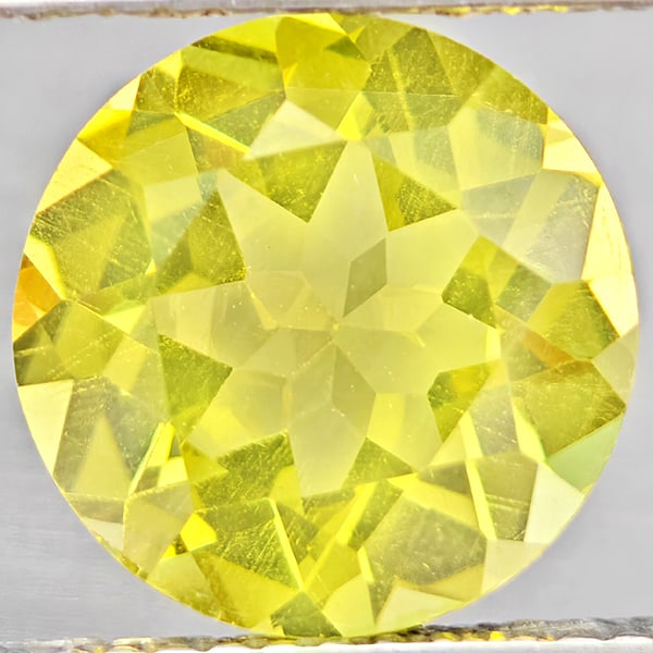 Natural Yellow Lemon Quartz Gemstones 3.31 Ct. Round Shape 10 Mm.: Product ID: 805530200 Product Name: Natural Quartz Weight: 3.31 CT. Size: 10 x 10 x 5.9 MM. Shape: Round Shape Color: Yellow Lemon Clarity:VSI Luster: Good Gems Origin: Brazil Treatment: Unheated Crys