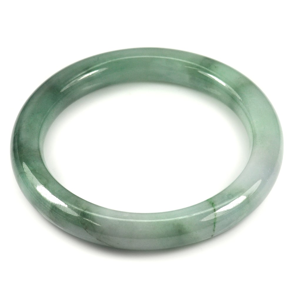 Natural Multi Color Gemstones Bangle 237.54 Ct. Diameter 55 Mm.: Product ID: 819815120 Product Name: Natural Jade Weight: 237.54 CT. Size: 72 x 55 x 9 MM. Shape: Round Cabochon Color: Multi Color Clarity:Opaque Luster: Good Gems Origin: Thailand Treatment: Unheated