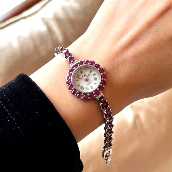 Natural Red Ruby 925 Sterling Silver Ladies Wristwatch Jewelry Length 7.5 Inch.: Product ID: 201100130 Product Type: 925 Sterling Silver Fine Jewelry Jewelry Weight: 22.07 Grams. Gemstones Color: Red Metal: Solid Silver 92.5%. Gemstone Detail: Natural Purplish Red Ruby Round 3 x 3