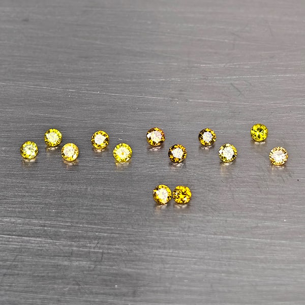 Natural Yellow Diamond 0.23 Ct. 13 Pcs. Round Diamond Cut 1.9 Mm.: Product ID: 802104604 Product Name: Natural Natural Diamond Weight: 0.23 CT. Size: 1.9 x 1.9 x 1.3 MM. Shape: Round Diamond Cut Color: Yellow Clarity:VVS - VSI Luster: Scintillating Gems Origin: Belgi