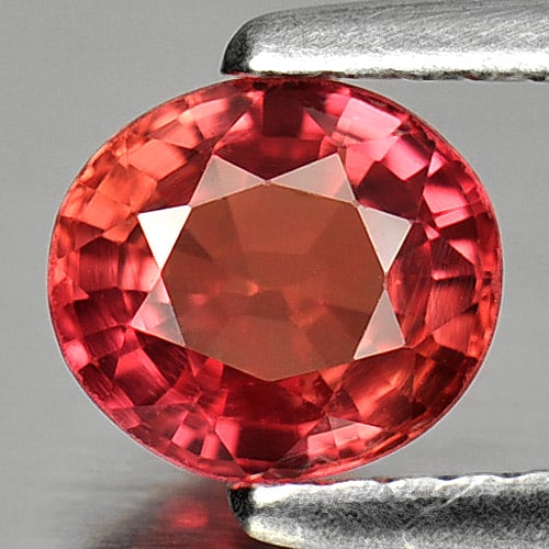Natural Orangish Red Songea Sapphire Gemstones 1.10 Ct. Oval Shape 6.2 x 5.6 Mm.: Product ID: 806152162 Product Name: Natural Red Sapphire Weight: 1.10 CT. Size: 6.2 x 5.6 x 3.4 MM. Shape: Oval Color: Orangish Red Clarity:VVS Luster: Very Good Gems Origin: Tanzania Treatment: Heate