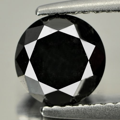 Natural Black Diamond 1.66 Ct. Round Brilliant Cut 6.7 Mm.: Product ID: 802102604 Product Name: Natural Natural Diamond Weight: 1.66 CT. Size: 6.7 x 6.7 x 5.3 MM. Shape: Round Brilliant Cut Color: Black Clarity:Opaque Luster: Good Gems Origin: Belgium Treatmen