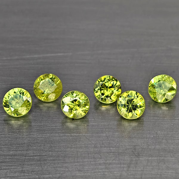 Natural Green Demantiod Garnet Gemstones 1.14 Ct. 6 Pcs Round Diamond Cut 3.4 Mm.: Product ID: 802937777 Product Name: Natural Demantoid Weight: 1.14 CT. Size: 3.4 x 3.4 x 2.4 MM. Shape: Round Diamond Cut Color: Green Clarity:SI1 Luster: Good Gems Origin: Madagascar Treatment: Unhea