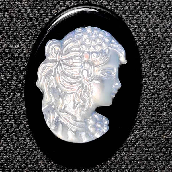 Natural White Sea Shell 6.47 Ct. Woman Carving Cameo on Onyx 18 x 13 Mm.: Product ID: 805206418 Product Type: 925 Sterling Silver Fine Jewelry Jewelry Weight: 6.47 Grams. Gemstones Color: White Metal: Solid Silver 92.5%. Gemstone Detail: Sea Shell At Your Service: At Treasu