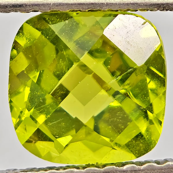 Natural Green Peridot Gemstones 1.78 Ct. Cushion Shape 6.8 Mm.: Product ID: 805317532 Product Name: Natural Peridot Weight: 1.78 CT. Size: 6.8 x 6.8 x 5.2 MM. Shape: Cushion Shape Color: Green Clarity:SI1 Luster: Good Gems Origin: Pakistan Treatment: Unheated Crys