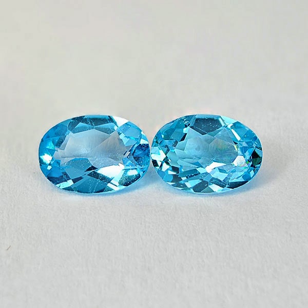 Natural Swiss Blue Topaz Gemstones 1.68 Ct. Oval Shape 7 x 5 Mm.: Product ID: 807167802 Product Name: Natural Blue Topaz Weight: 1.68 CT. Size: 7 x 5 x 2.9 MM. Shape: Oval Color: Swiss Blue Clarity:VSI Luster: Good Gems Origin: Brazil Treatment: Treated Crystal Stru