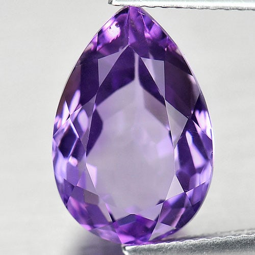Natural Purple Amethyst Gemstones 6.10 Ct. Pear Shape 15 x 10 Mm.: Product ID: 800325193 Product Name: Natural Amethyst Weight: 6.10 CT. Size: 15 x 10 x 7 MM. Shape: Pear Color: Purple Clarity:VVS Luster: Very Good Gems Origin: Brazil Treatment: Unheated Crystal Stru