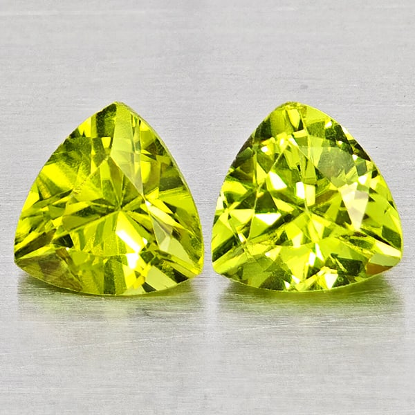 Natural Green Peridot Gemstones 1.48 Ct. 2 Pcs. Trilliant Shape 6 Mm.: Product ID: 805317553 Product Name: Natural Peridot Weight: 1.48 CT. Size: 6 x 6 x 3.8 MM. Shape: Trilliant Color: Green Clarity:SI1 Luster: Good Gems Origin: Pakistan Treatment: Unheated Crystal Stru