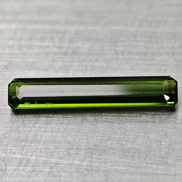Natural Green Tourmaline Gemstones 1.05 Ct. Ocatgon Shape 14.9 x 2.9 Mm.: Product ID: 807250832 Product Name: Natural Tourmaline Weight: 1.05 CT. Size: 14.9 x 2.9 x 2.2 MM. Shape: Octagon Color: Green Clarity:VVS Luster: Good Gems Origin: Nigeria Treatment: Unheated Crystal