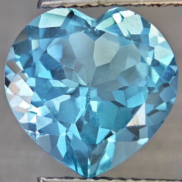 Natural Baby Blue Topaz Gemstones 5.20 Ct. Heart Shape 11.1 Mm.: Product ID: 807168744 Product Name: Natural Blue Topaz Weight: 5.20 CT. Size: 11.1 x 11.1 x 6.5 MM. Shape: Heart Shape Color: Baby Blue Clarity:VSI Luster: Good Gems Origin: Brazil Treatment: Treated 