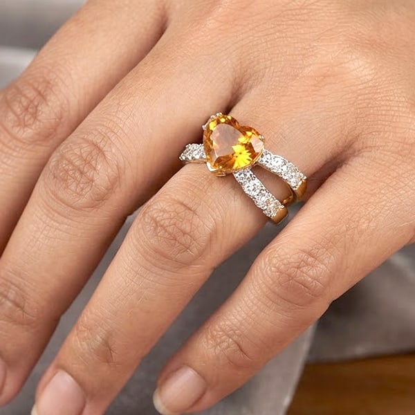 Natural Yellow Sapphire 2.53 Ct. & Diamond 0.72 Ct. with 18K Yellow Gold Ring Jewelry 6.10 G. Size 6: Jewelry Setting Metal: 18K Yellow Gold Jewelry Weight: 6.1 Grams. Gemstones Details Product ID: 200200469 Product Name: Gold Jewelry Gemstone: Total Gem Weight: 2.53 CT. Gems Size: 9.6 x 7.7 x 3.8 MM.
