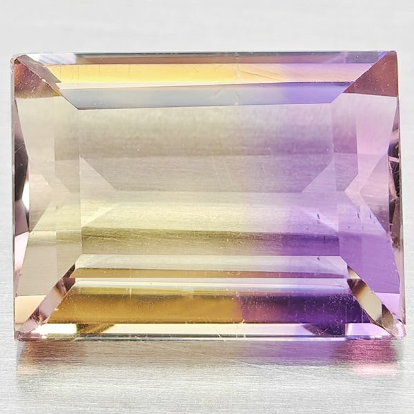 Natural Bi Color Ametrine Gemstones 3.76 Ct. Baguette Shape 10.7 x 8 Mm: Product ID: 800408440 Product Name: Natural Ametrine Weight: 3.76 CT. Size: 10.7 x 8 x 5.2 MM. Shape: Baguette Color: Bi Color Clarity:VSI Luster: Good Gems Origin: Bolivia Treatment: Unheated Crystal
