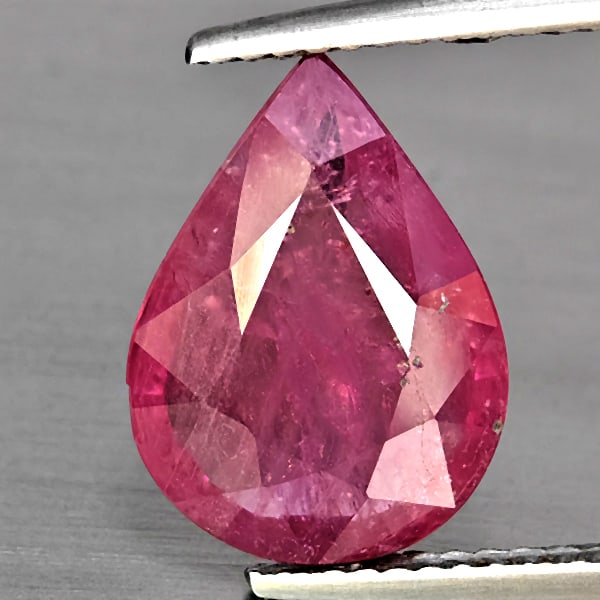 Natural Red Ruby Gemstones 4.17 Ct. Oval Shape 13.3 x 9.6 Mm.: Product ID: 805923428 Product Name: Natural Ruby Weight: 4.17 CT. Size: 13.3 x 9.6 x 3.9 MM. Shape: Pear Color: Red Clarity:SI Luster: Good Gems Origin: Mozambique Treatment: Heated (Lead-glass fillin