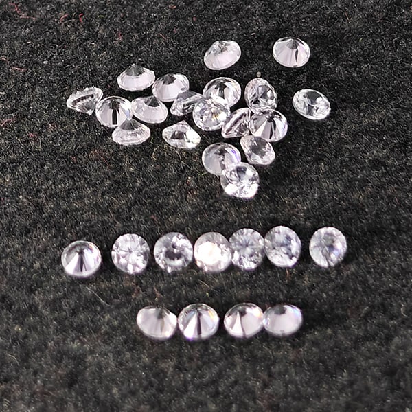 Natural White Zircon Gemstones 0.64 Ct. 30 Pcs. Round Diamond Cut 1.5 Mm: Product ID: 807743160 Product Name: Natural Zircon Weight: 0.64 CT. Size: 1.5 x 1.5 x 1.2 MM. Shape: Round Diamond Cut Color: White Clarity:VSI Luster: Good Gems Origin: Cambodia Treatment: Heated Cry