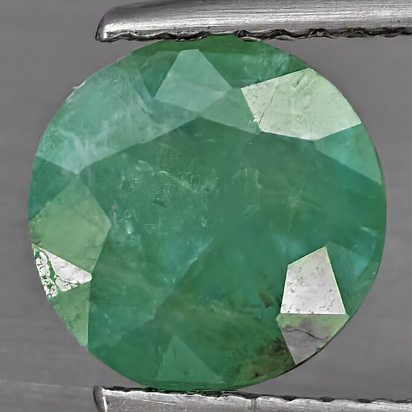 Natural Green Blueish Grandidierite Gemstones 1.68 Ct. Round Shape 8.2 Mm.: Product ID: 803100124 Product Name: Natural Tsavorite Weight: 1.68 CT. Size: 8.2 x 8.2 x 4 MM. Shape: Round Shape Color: Green Blueish Clarity:SI1 Luster: Good Gems Origin: Madagascar Treatment: Unhea