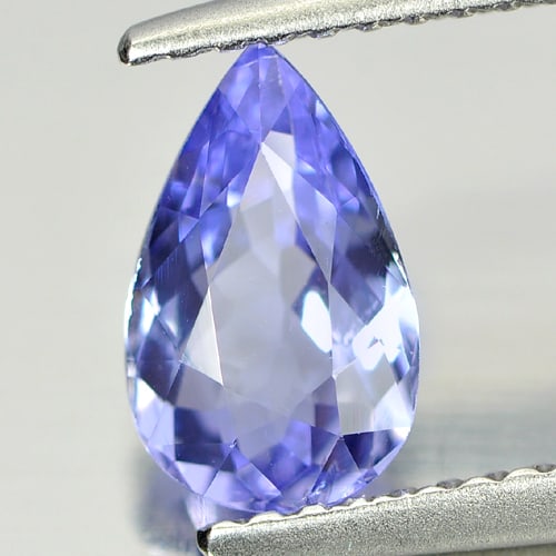 Natural Violetish Blue Tanzanite Gemstones 1.00 Ct. Pear Shape 8.6 x 5.4 Mm.: Product ID: 807005988 Product Name: Natural Tanzanite Weight: 1.00 CT. Size: 8.6 x 5.4 x 3.3 MM. Shape: Pear Color: Purple Clarity:VVS Luster: Good Gems Origin: Tanzania Treatment: Heated Crystal Stru
