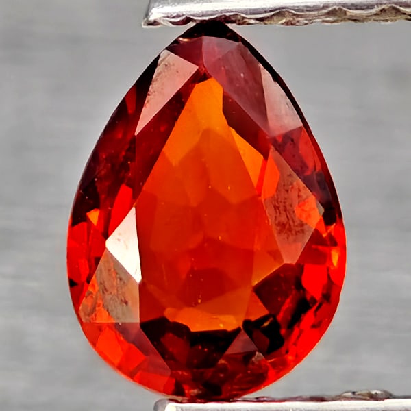 Natural Orangish Red Spessartine Garnet Gemstones 0.58 Ct. Pear Shape 6.2 x 4.5 Mm: Product ID: 802937342 Product Name: Natural Garnet Weight: 0.58 CT. Size: 6.2 x 4.5 x 2.4 MM. Shape: Pear Shape Color: Orangish Red Clarity:SI1 Luster: Good Gems Origin: Namibia Treatment: Unheated Cr
