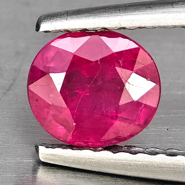 Natural Purplish Pink Ruby Gemstones 0.87 Ct. Oval Shape 6.1 x 5.4 Mm.: Product ID: 805926993 Product Name: Natural Ruby Weight: 0.87 CT. Size: 6.1 x 5.4 x 3.2 MM. Shape: Oval Color: Purplish Pink Clarity:VSI Luster: Good Gems Origin: Tanzania Treatment: Heated (Lead-glas