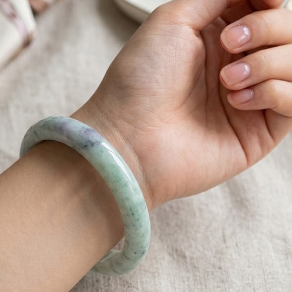 Natural Multi-Color Jade Gemstones Bangle 382.46 Ct. Round Cabochon Diameter 60 Mm.: Product ID: 819815358 Product Name: Natural Jade Weight: 382.46 CT. Size: 80 x 60 x 14 MM. Shape: Round Color: Multi-Color Clarity:Opaque Luster: Good Gems Origin: Thailand Treatment: Unheated Crystal