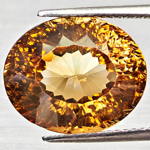 Natural Imperial Topaz Gemstones 11.47 Ct. Oval Concave Cut 11.9 x 14.4 Mm.: Product ID: 807168255 Product Name: Natural Topaz Weight: 11.47 CT. Size: 11.9 x 14.4 x 9.2 MM. Shape: Oval Concave Cut Color: Imperial Clarity:VVS Luster: Very Good Gems Origin: Brazil Treatment: Non