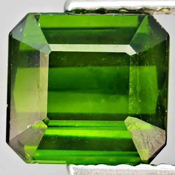 Natural Green Tourmaline Gemstones 1.59 Ct. Octagon Shape 6.7 x 6.3 Mm.: Product ID: 807251004 Product Name: Natural Tourmaline Weight: 1.59 CT. Size: 6.7 x 6.3 x 4.5 MM. Shape: Octagon Color: Green Clarity:SI1 Luster: Good Gems Origin: Nigeria Treatment: Unheated Crystal 