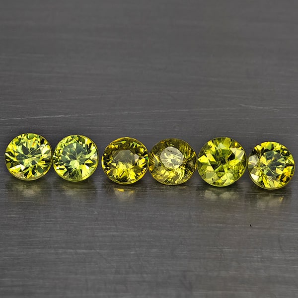 Natural Green Demantiod Garnet Gemstones 1.13 Ct. 6 Pcs. Round Diamond Cut 3.4 Mm.: Product ID: 802937778 Product Name: Natural Demantoid Weight: 1.13 CT. Size: 3.4 x 3.4 x 2.2 MM. Shape: Round Diamond Cut Color: Green Clarity:SI1 Luster: Good Gems Origin: Madagascar Treatment: Unhea