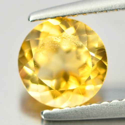Natural Yellow Citrine Gemstones 1.30 Ct. Round Shape 7.1 Mm.: Product ID: 801811482 Product Name: Natural Citrine Weight: 1.30 CT. Size: 7.1 x 7.1 x 4.6 MM. Shape: Round Color: Yellow Clarity:VSI Luster: Good Gems Origin: Brazil Treatment: Unheated Crystal Struc