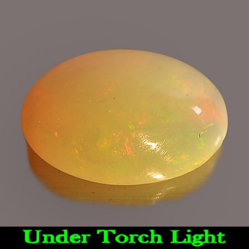 Natural Multi Color Play Of Colour Opal Gemstones 1.07 Ct. Oval Cabochon Shape 9.1 x 7 Mm.: Product ID: 818725219 Product Name: Natural Opal Weight: 1.07 CT. Size: 9.1 x 7 x 3.8 MM. Shape: Oval Cabochon Color: Multi Color Clarity:Semi - Transparent Luster: Iridescent Gems Origin: Ethiopia Tr
