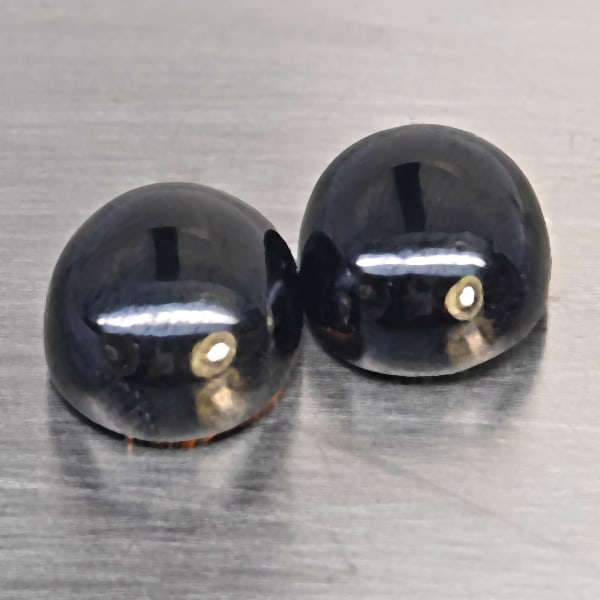 Natural Black Spinel Gemstones 17.92 Ct. 2 Pcs. Oval Cabochon Shape 12.5 x 10.6 Mm.: Product ID: 806609932 Product Name: Natural Spinel Weight: 17.92 CT. Size: 12.5 x 10.6 x 6.8 MM. Shape: Oval Cabochon Color: Black Clarity:Opaque Luster: None Gems Origin: Thailand Treatment: Unheated