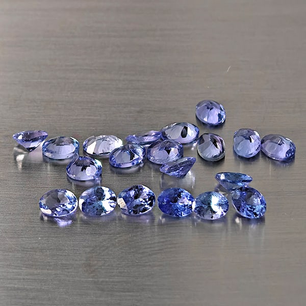 Natural Violetish Blue Tanzanite Gemstones 3.53 Ct. 20 Pcs. Oval Shape and Mixed Size: Product ID: 807015124 Product Name: Natural Tanzanite Weight: 3.53 CT. Size: 4 x 3.2 x 2 to 3.9 x 3 x 2.4 MM. Shape: Oval Color: Violetish Blue Clarity:VSI Luster: Good Gems Origin: Tanzania Treatment