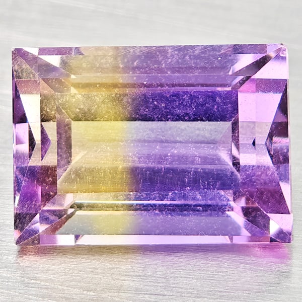Natural Bi Color Ametrine Gemstones 2.14 Ct. Baguette Shape 8.9 x 6.3 Mm.: Product ID: 800408537 Product Name: Natural Ametrine Weight: 2.14 CT. Size: 8.9 x 6.3 x 4.9 MM. Shape: Baguette Color: Bi Color Clarity:VSI Luster: Good Gems Origin: Bolivia Treatment: Unheated Crysta