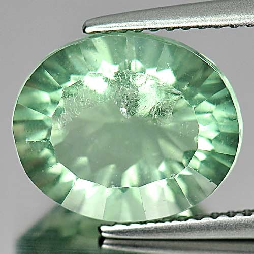 Natural Green Fluorite Gemstones 6.07 Ct. Oval Concave Cut 12.3 x 10.3 Mm.: Product ID: 802705185 Product Name: Natural Fluorite Weight: 6.07 CT. Size: 12.3 x 10.3 x 7.2 MM. Shape: Oval Concave Cut Color: Green Clarity:SI Luster: Good Gems Origin: Brazil Treatment: Unheated C