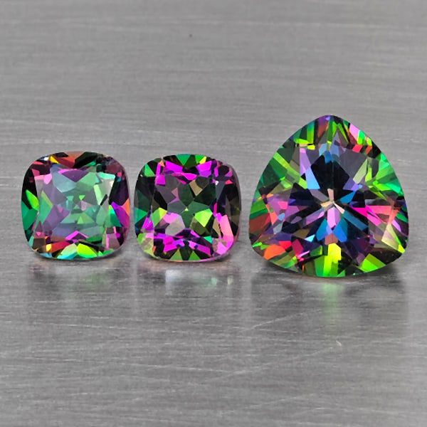 Natural Mystic Green Topaz Gemstones 5.58 Ct. 3 Pcs. Mixed Shape and Mixed Size: Product ID: 807169093 Product Name: Natural Topaz Weight: 5.58 CT. Size: 9.1 x 9.1 x 6.1 to 6.3 x 6.3 x 3.7 MM. Shape: Mixed Shape Color: Mystic Green Clarity:VSI Luster: Good Gems Origin: Brazil Trea