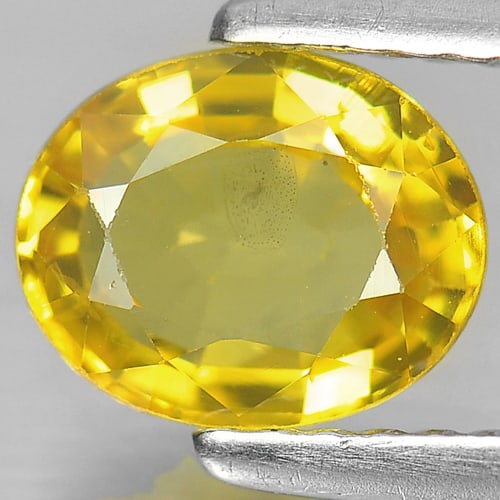 Natural Yellow Sapphire Gemstones 1.31 Ct. Oval Shape 7.2 x 5.9 Mm.: Product ID: 806151122 Product Name: Natural Yellow Sapphire Weight: 1.31 CT. Size: 7.2 x 5.9 x 3.2 MM. Shape: Oval Color: Yellow Clarity:VSI Luster: Good Gems Origin: Thailand Treatment: Heated Crysta