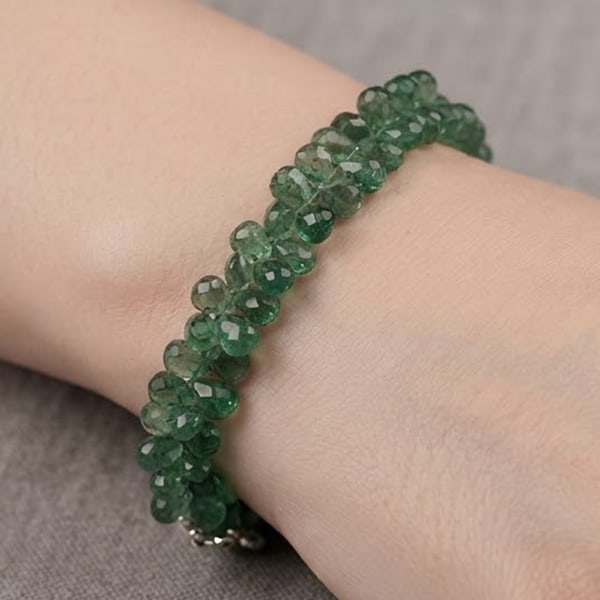 Natural Green Apatite Gemstones 64.00 Ct. Briolette Beads Length 8 Inch: Product ID: 800607700 Product Name: Natural Apatite Weight: 64.00 CT. Size: 8 Inch. / 7.3 x 4.2 MM. Shape: Briolette With Drilled Color: Green Clarity:VVS Luster: Good Gems Origin: Tanzania Treatment: