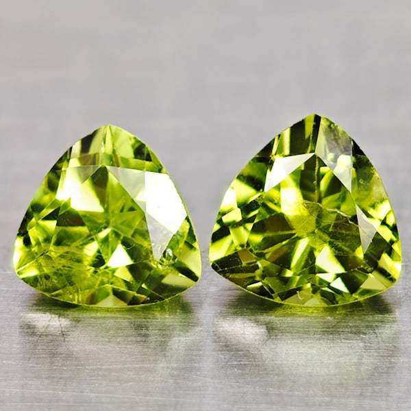 Natural Green Peridot Gemstones 1.81 Ct. 2 Pcs. Trilliant Shape 5.7 Mm.: Product ID: 805317078 Product Name: Natural Peridot Weight: 1.81 CT. Size: 5.7 x 5.7 x 4.1 MM. Shape: Trilliant Color: Green Clarity:VSI Luster: Good Gems Origin: Pakistan Treatment: Unheated Crystal 